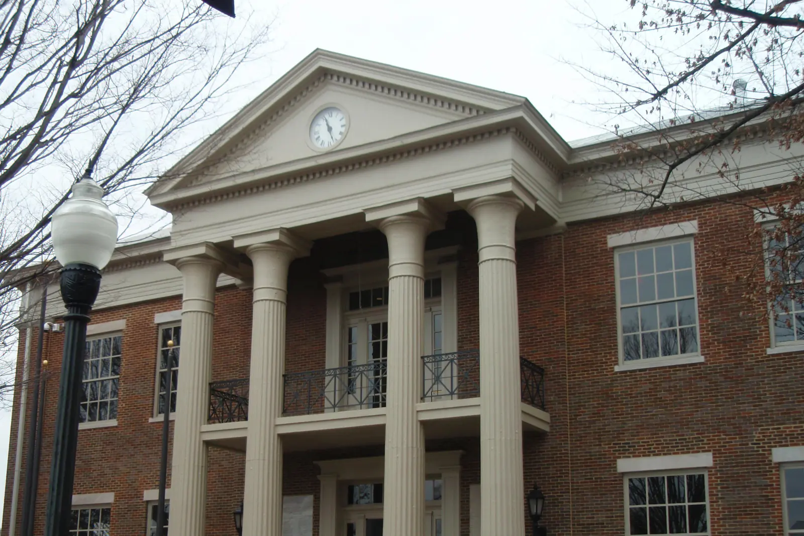 The clock and four-column portico of the historic Williamson County Courthouse in Franklin, Tennessee